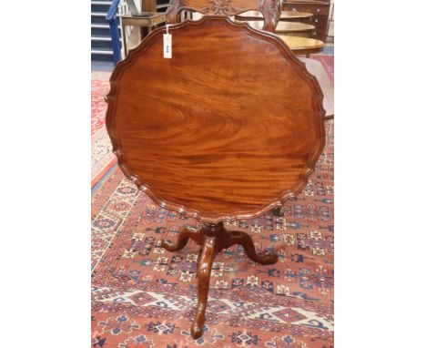 A Chippendale style mahogany piecrust tilt top circular tripod table Diameter 86cm