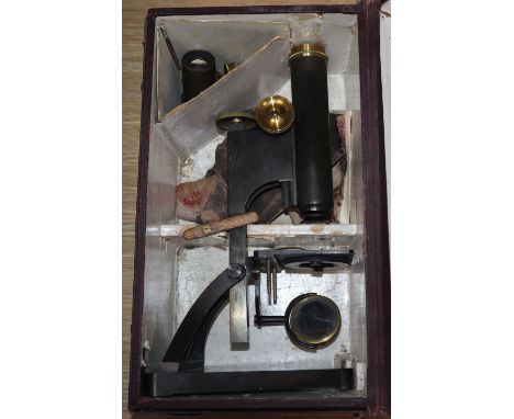 A late Victorian lacquered brass microscope by R + J Beck