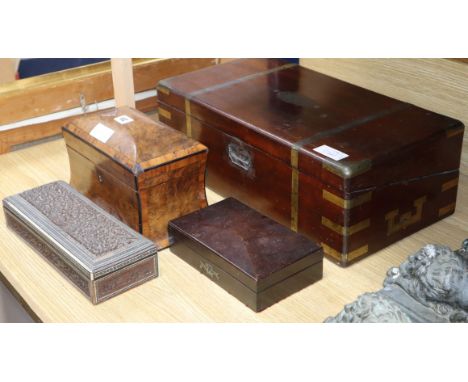 A Victorian walnut tea caddy, a writing slope and two other boxes