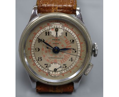 A gentleman's mid 20th century steel Pierce chronograph manual wind wrist watch, on brown leather strap.