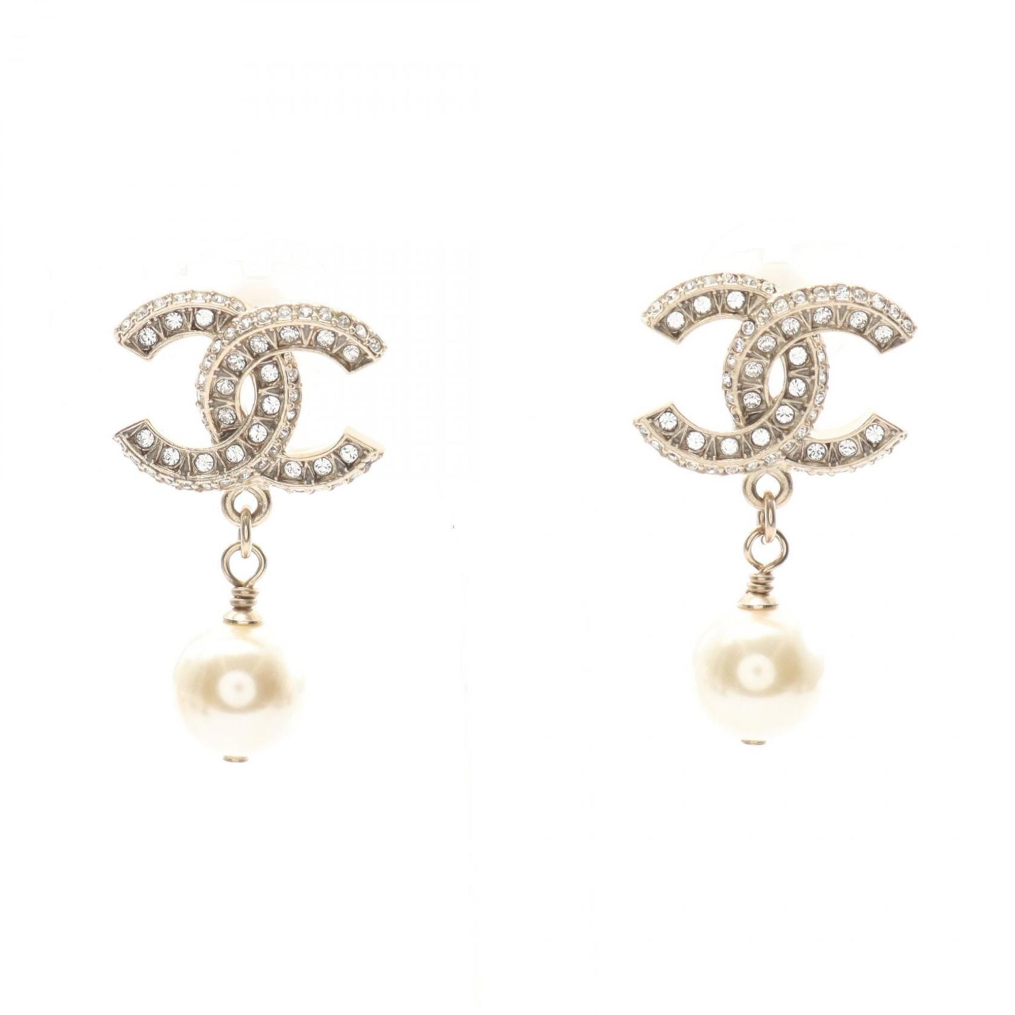 CHANEL Coco Mark earrings with gold-plated rhinestones and faux pearls. Available in gold, clear, wh
