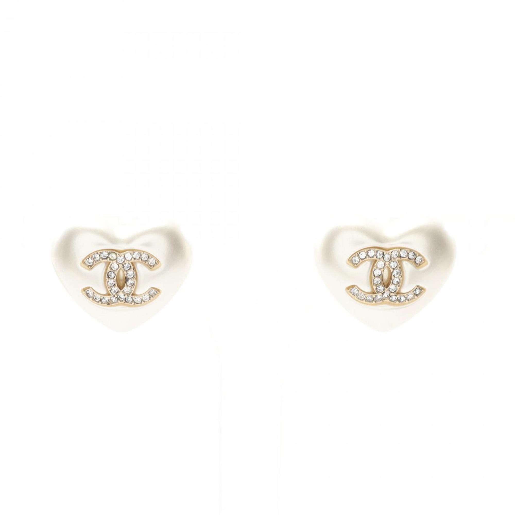 CHANEL Coco Mark earrings with gold-plated faux pearls and rhinestones. Available in white, gold, cl
