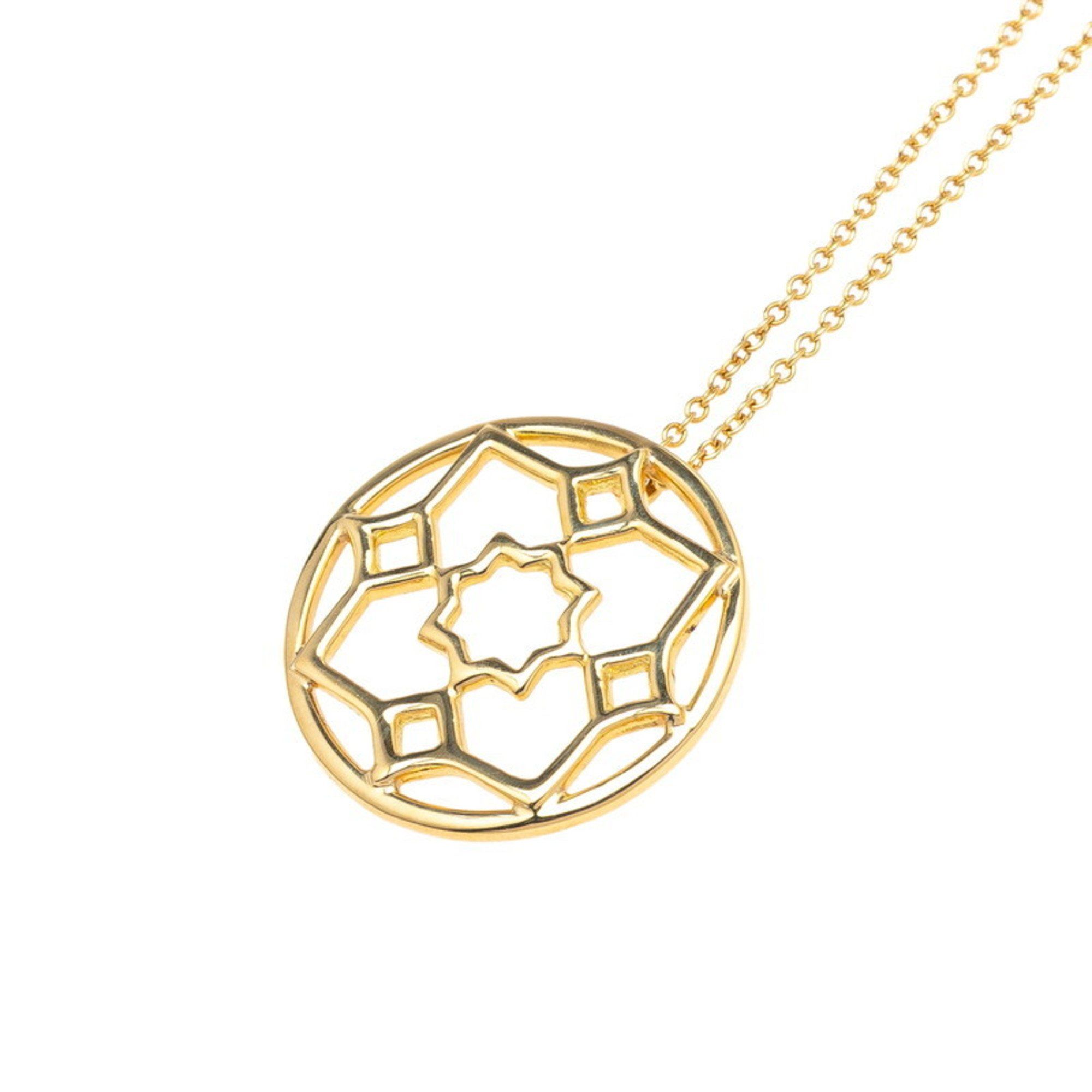 Tiffany & Co. Paloma Picasso Marrakech pendant necklace in 18k yellow gold for women. TIFFANY
