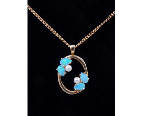 A 9ct yellow gold, pearl and opal circular pendant, suspended on a 9ct yellow gold chain. 