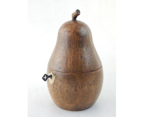 A fruitwood tea caddy, modelled as a pear. H. 18cm