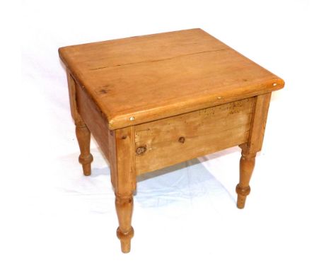 A Victorian pine commode on turned feet.