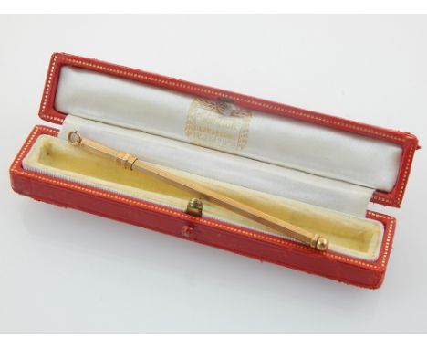 A 9ct gold Cartier swizzle stick, with box, 6g.