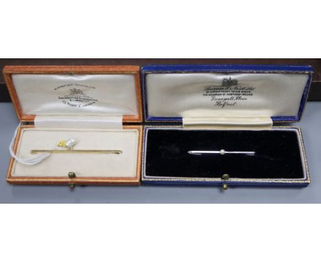 A George V 15ct, baroque pearl and enamel 'hatching chick' bar brooch, gross 2.8 grams, 50mm and a 9ct and seed pearl bar bro