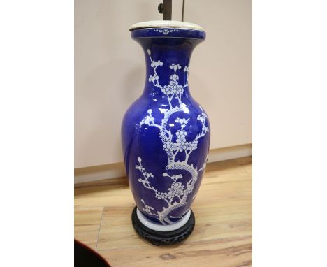 A large Chinese blue and white prunus vase, mounted as a table lamp, drilled base, total height fitting 66cm