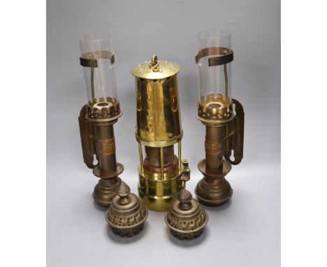 Railway interest: A pair of GWR wall mounted brass oil lamps, together with a protector lamp and lighting miner's lamp