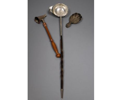A George III silver caddy spoon, Joseph Wilmore, Birmingham, 1814, a silver candle snuffer and a white metal toddy ladle, wit