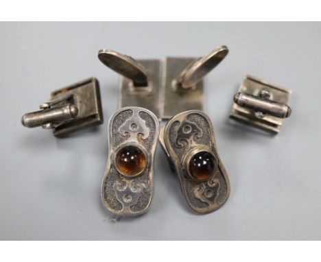 Three pairs of silver cufflinks including a 1970's pair by Georg Jensen Ltd, design no.109.