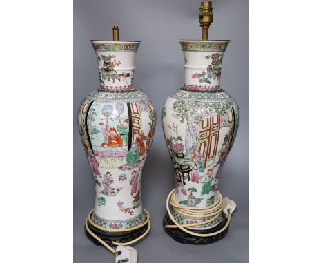 A pair of Chinese-style famille rose table lamps and shades, total height to fitting 57.5cm, one lamp fitting lacking