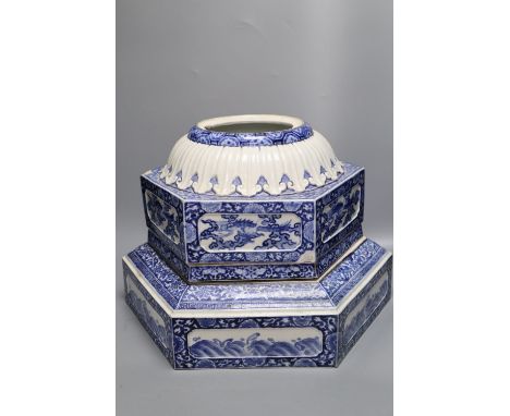 Two Japanese blue and white Arita porcelain hexagonal plinth bases, c.1900, largest 41cm wide