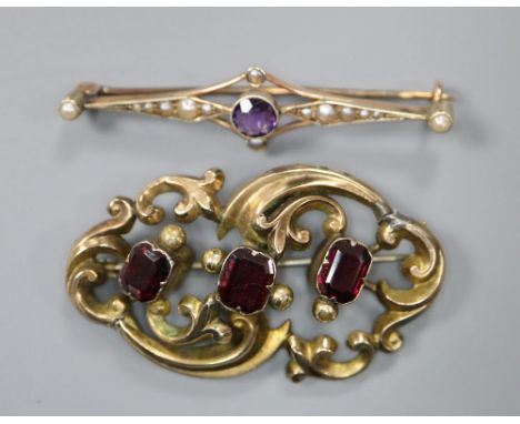 A 9ct gold, amethyst and seed pearl bar brooch, gross 2.9g and a Victorian pierced scrollwork brooch set with three garnets