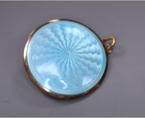 An Edwardian yellow metal, two colour enamel and seed pearl set circular pendant, 22mm, gross 5 grams.CONDITION: There are so