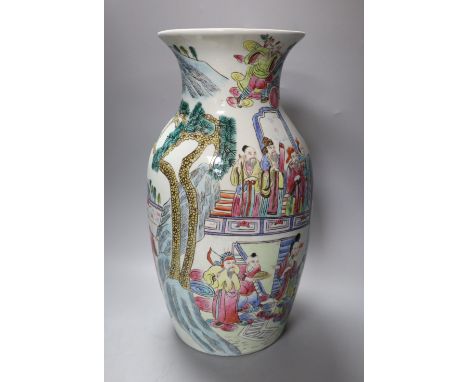 A Chinese porcelain baluster vase, painted with figures in famille rose enamels, height 39cm