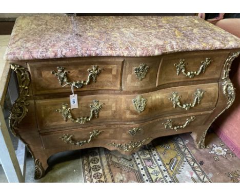 A serpentine Louis XVI-style marble top bombe commode, width 130cm, depth 54cm, height 84cm
