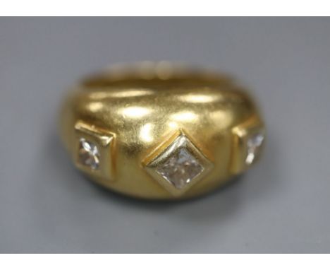 An 18k and three stone square cut diamond set ring, size M, gross 10.8 grams.CONDITION: No visible damage to any of the stone