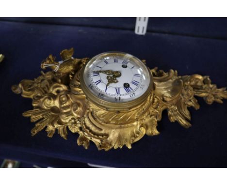 A Louis XV ormolu cartel clock case with later movement
