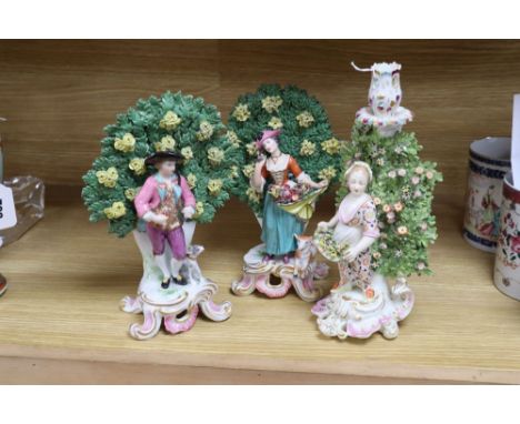 A pair of Samson porcelain bocage figures, and a Samson bocage candlestick figure, latter 28cm