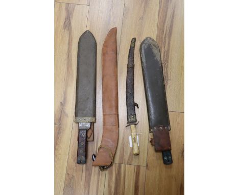 An Islamic tusk handled dagger and three 20th century machetes, longest 60cm