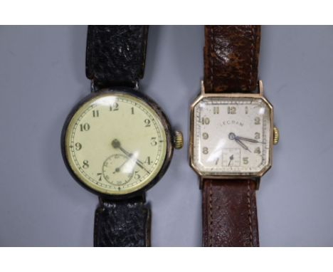 A gentleman's 9ct gold Lecram manual wind wrist watch and a similar early 20th century silver wrist watch.