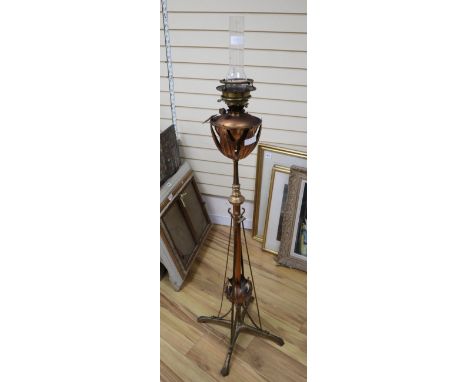 An Art Nouveau Benson style copper oil lamp standard, overall height 160cm