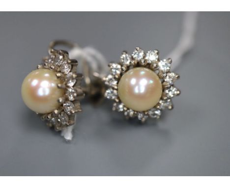 A pair of 18ct white gold, cultured pearl and diamond cluster earrings, post and butterfly fittings, 12mm, gross 6.2g.