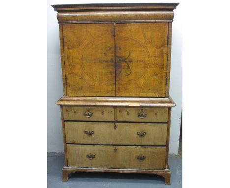 18TH CENTURY WALNUT CABINET UPON CHEST, having moulded cornice over blind cushion frieze drawer, two geometrically crossbande