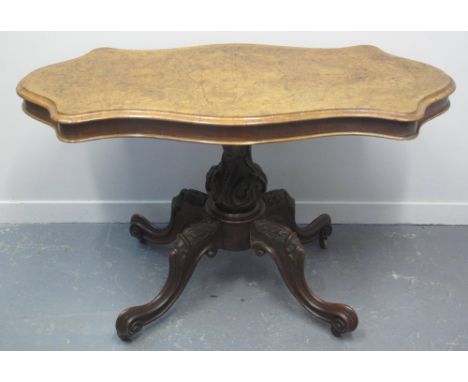 VICTORIAN INLAID WALNUT, SERPENTINE SHAPED, PEDESTAL OCCASIONAL TABLE, the top decorated with satinwood scrolled foliate desi