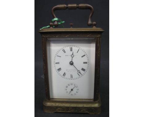 19TH CENTURY FRENCH BRASS CARRIAGE CLOCK having full depth Roman enamel face with alarm indicator, the face marked: James Rit