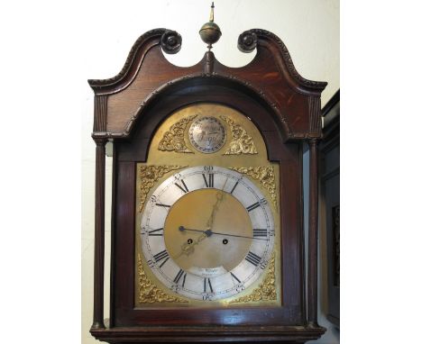 19TH CENTURY OAK EIGHT DAY LONG CASE CLOCK marked: T.O.S. Wilson, London, having broken swan neck pediment above arched apert