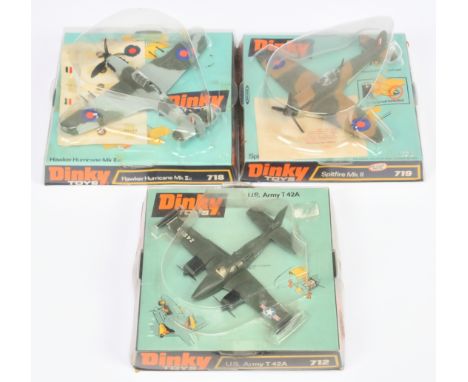 Dinky Toys group of Aircraft comprising of (1) 719 Spitfire Mk 2, (2) 712 US Army T 42A and (3) 718 Hawker Hurricane Mk 2C. C