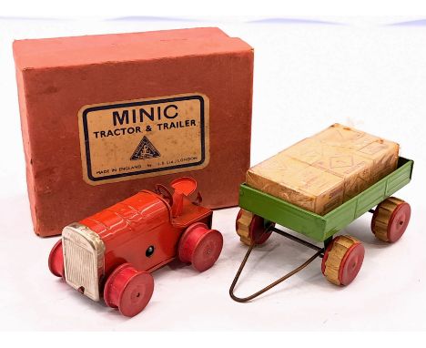 Triang Minic Pre War Tractor with Trailer 26M, tinplate, clockwork, red and green, wooden load, missing tracks, within Good b