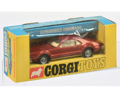 Corgi Toys 276 Oldsmobile Toronado - Metallic bronze/red, cream interior, grey plastic tow hook and "Golden Jacks" Take-off w