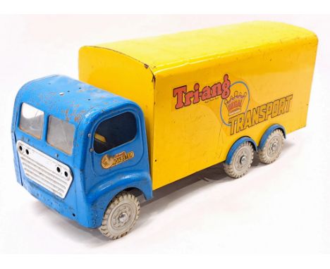 Triang pressed steel Regal Transport lorry, blue cab, yellow body, six wheels, cracks to windscreen, surface wear/corrosion t