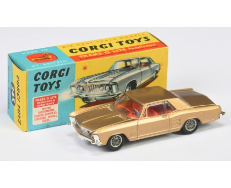 Corgi Toys 245 Buick Rivera - Gold Body, red interior, chrome bumpers, wire wheels, grey plastic tow hook, with "Trans-O-Lite