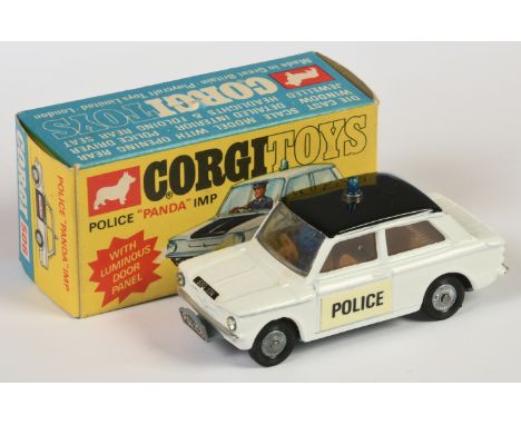 Corgi Toys 506 "Police" Sunbeam Imp Car - white body, black roof, brown interior with figure, silver trim, cast hubs and "Pol