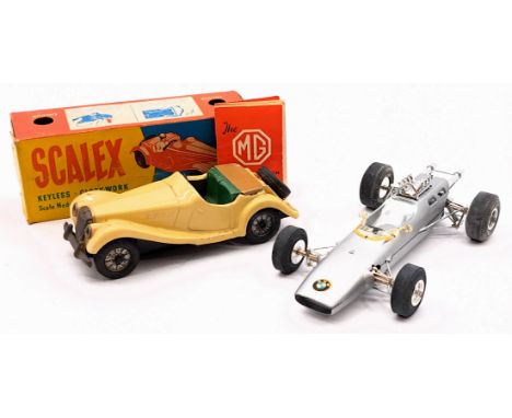 Tinplate and D]diecast modal car pair including: (1) Scalex 1/32nd scale tinplate clockwork MG TF, cream with green interior 
