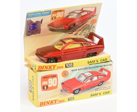 Dinky Toys 108 "Joe 90" Sam's Car - Metallic red body, silver engine cover and trim, yellow interior, cast hubs. Condition is
