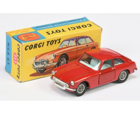 Corgi Toys 327 MGB GT - red body with pale blue interior, chrome trim, wire wheels, luggage case. Condition is Excellent Plus