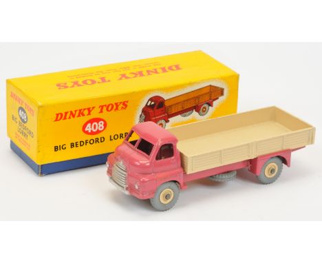 Dinky 408 Big Bedford Lorry - Pink cab and chassis, light beige back and supertoy hubs with grey tyres, silver trim and metal