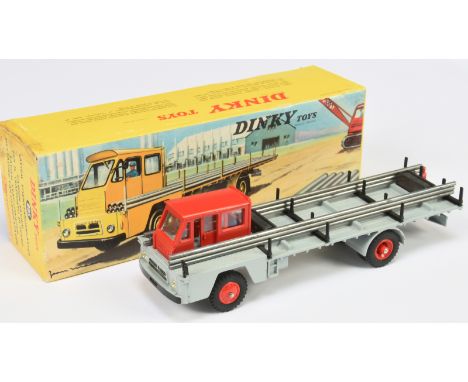 French Dinky 885 Camion Saviem Porte-Fer - grey, red plastic cab and hubs, with driver figure, correct pipe steel load. Condi