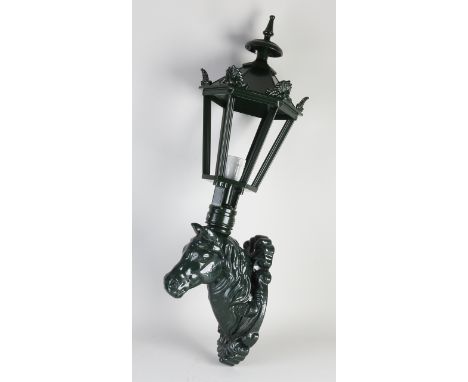 Large iron outdoor lantern with horse head.&nbsp;Painted green.&nbsp;21st century.&nbsp;Size: 80 cm.&nbsp;In good condition.