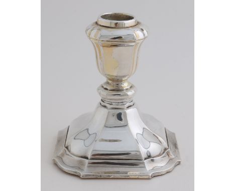 Silver candlestick, 835/000, on a square contoured base and fitted with a square contoured light.&nbsp;MT .: Jakob Grimminger