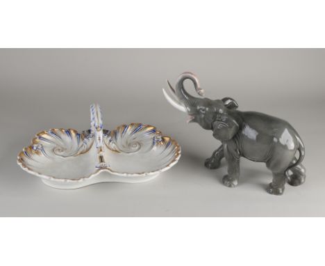 Two parts of German porcelain.&nbsp;First half of the 20th century.&nbsp;Consisting of: Elephant, marked H + S with crown.&nb
