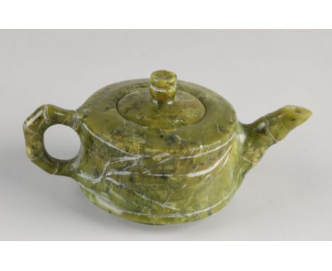 Antique Chinese jade teapot with bamboo decoration.&nbsp;Dimensions: 6.5 x 14 x Ø 7.5 cm.&nbsp;In good condition.