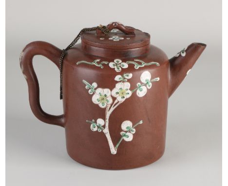 18th - 19th Century Chinese Yixing teapot with bottom mark and floral decoration.&nbsp;Minimal chips.&nbsp;Dimensions: 14.5 x