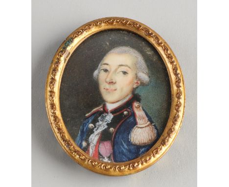 19th century miniature portrait of an officer, with gilt brass frame.&nbsp;Dimensions: H 4 x W 3 cm.&nbsp;In good condition.